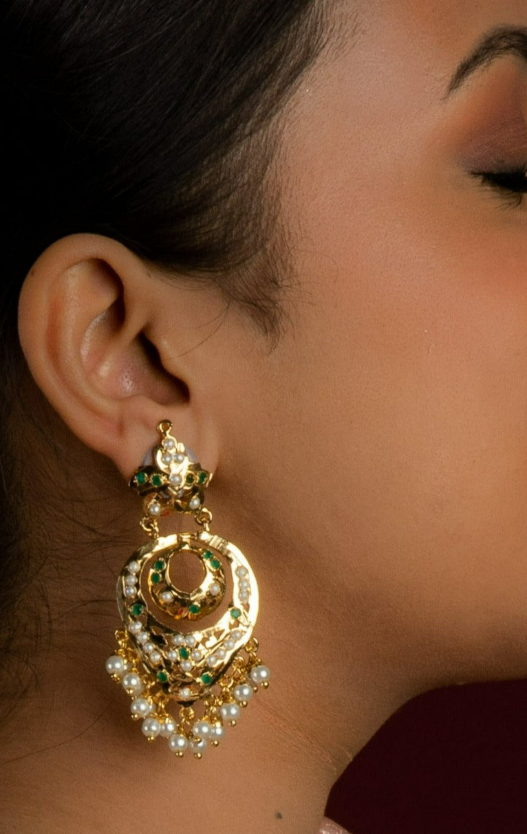 Adhira Jadau Chaandbali Earrings (Gold Plated with Emerald Green Stones and White Pearls) - QUEENS JEWELS