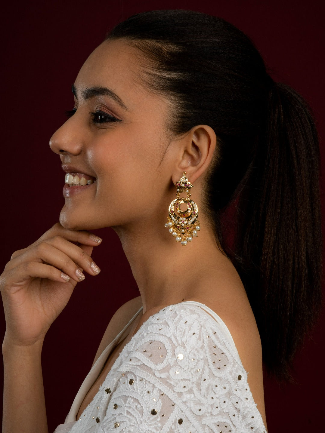 Adhira Jadau Chaandbali Earrings (Gold Plated with Ruby Red Stones and White Pearls) - QUEENS JEWELS