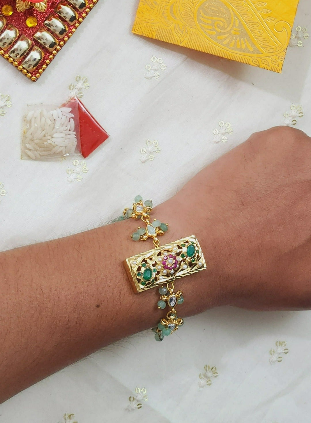 Mint Green Floral Rakhi Bracelet with Multicolor Jadau stones work