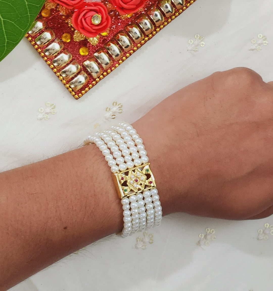 White Multistring Pearl Beaded Multicolor Jadau Rakhi Bracelet