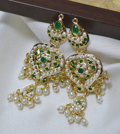 Gold plated green stones & white pearls petal shaped jadau chaandbali earrings.