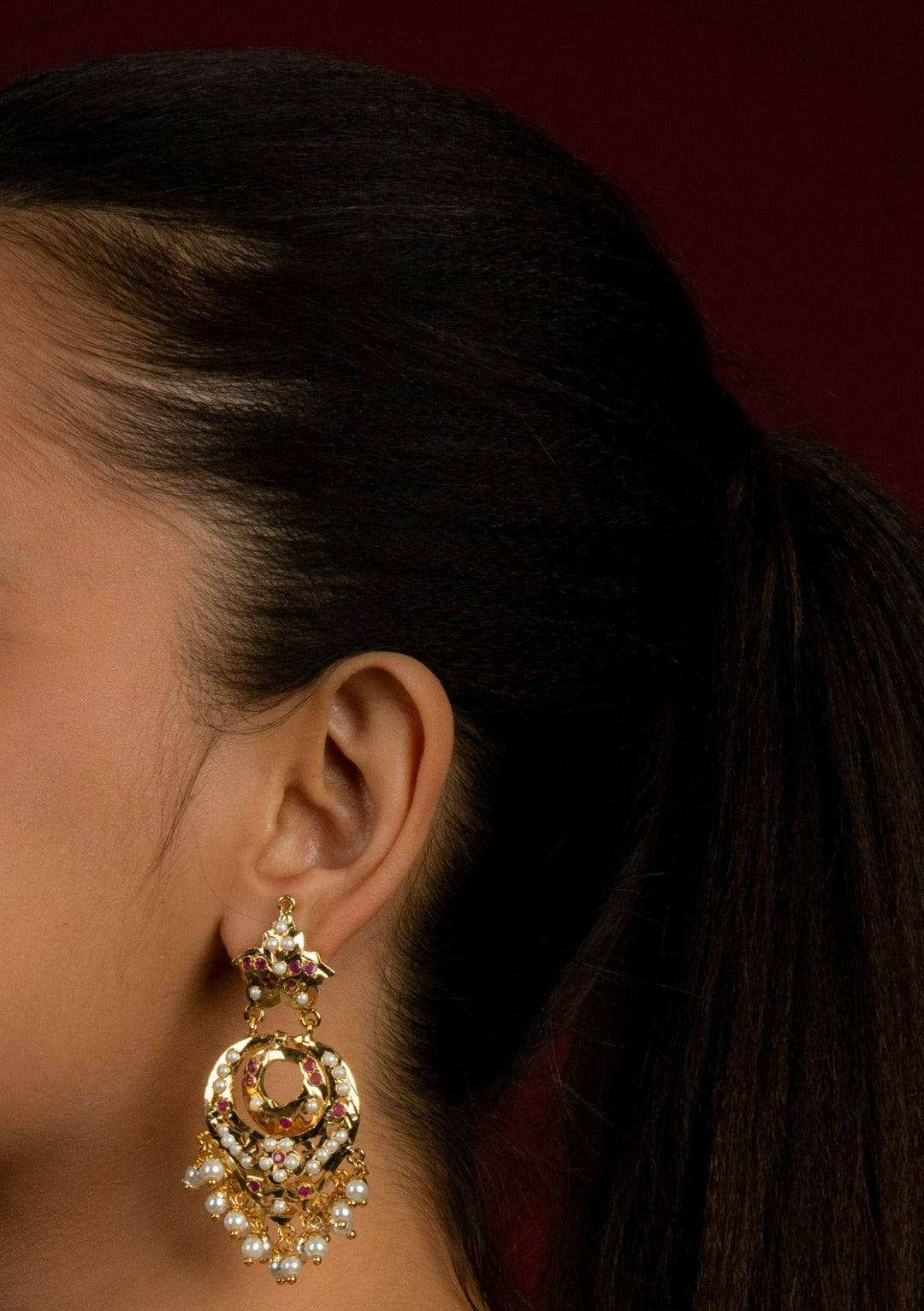 Adhira Jadau Chaandbali Earrings (Gold Plated with Ruby Red Stones and White Pearls) - QUEENS JEWELS