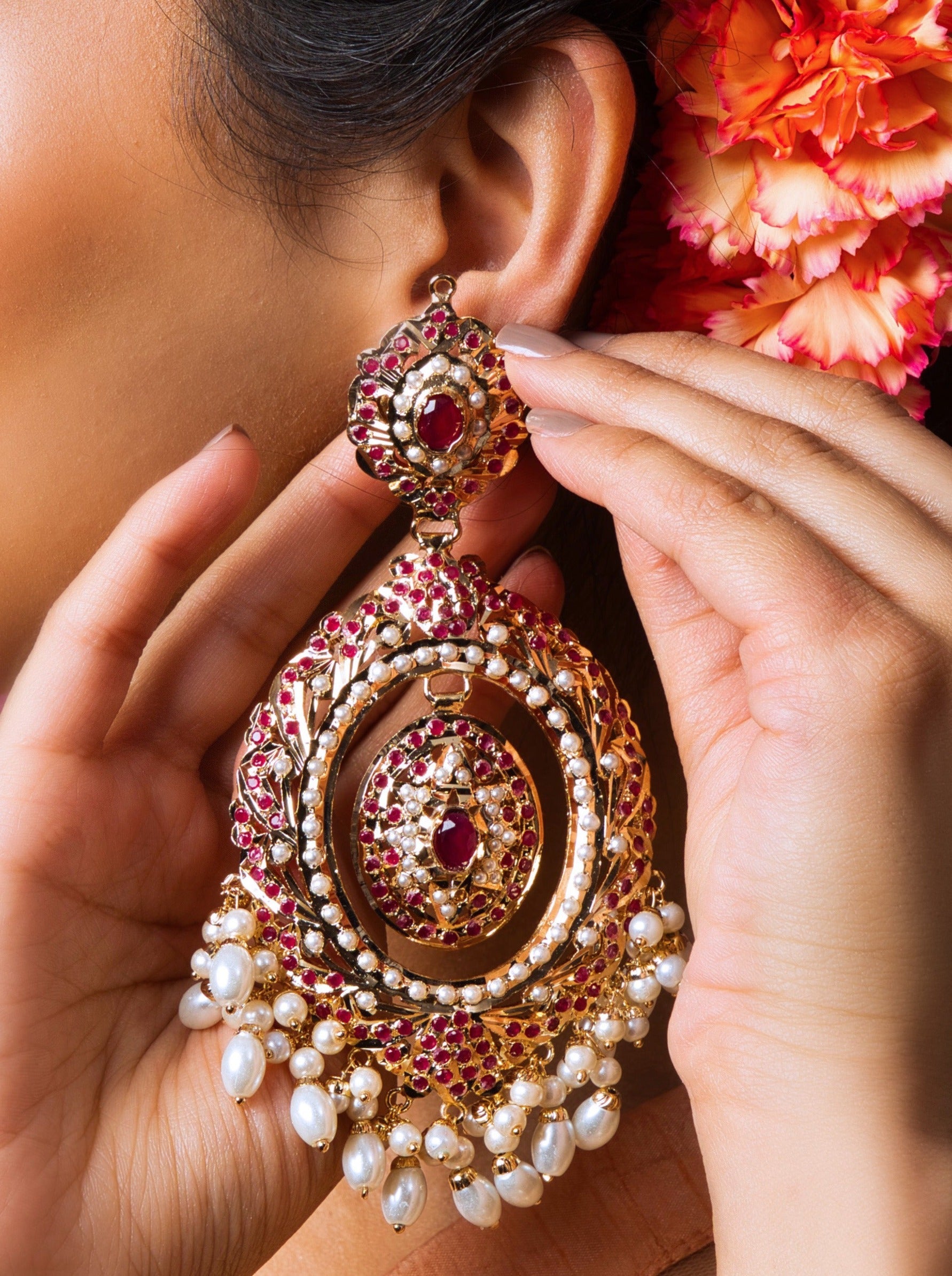 Crimson Crescent Egg Chaandbali: A cultural masterpiece with intricate details and 18 carat gold plating.