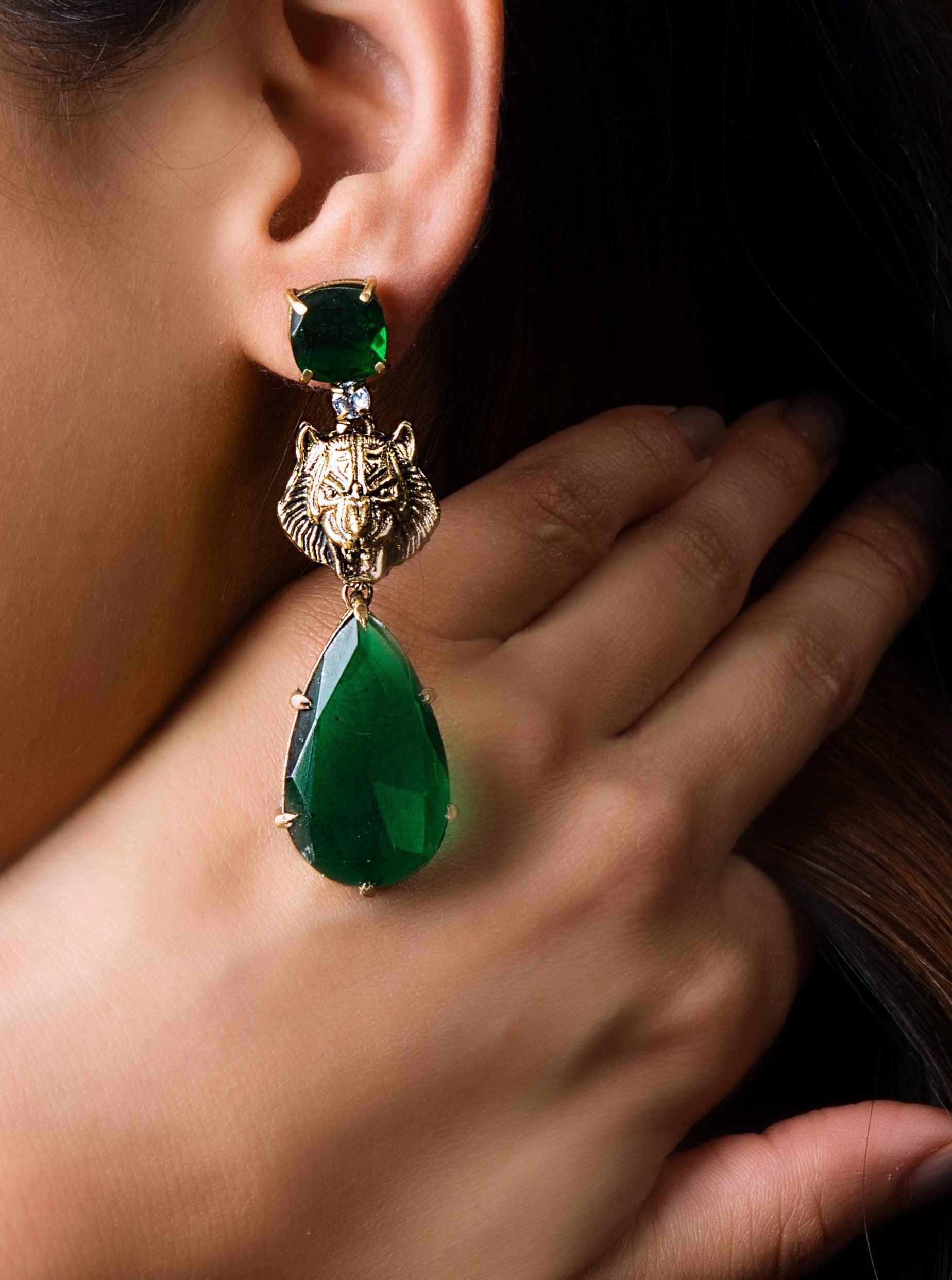 Emerald Green Lion Motif Earrings: Contemporary elegance meets edgy sophistication in sleek, geometric design