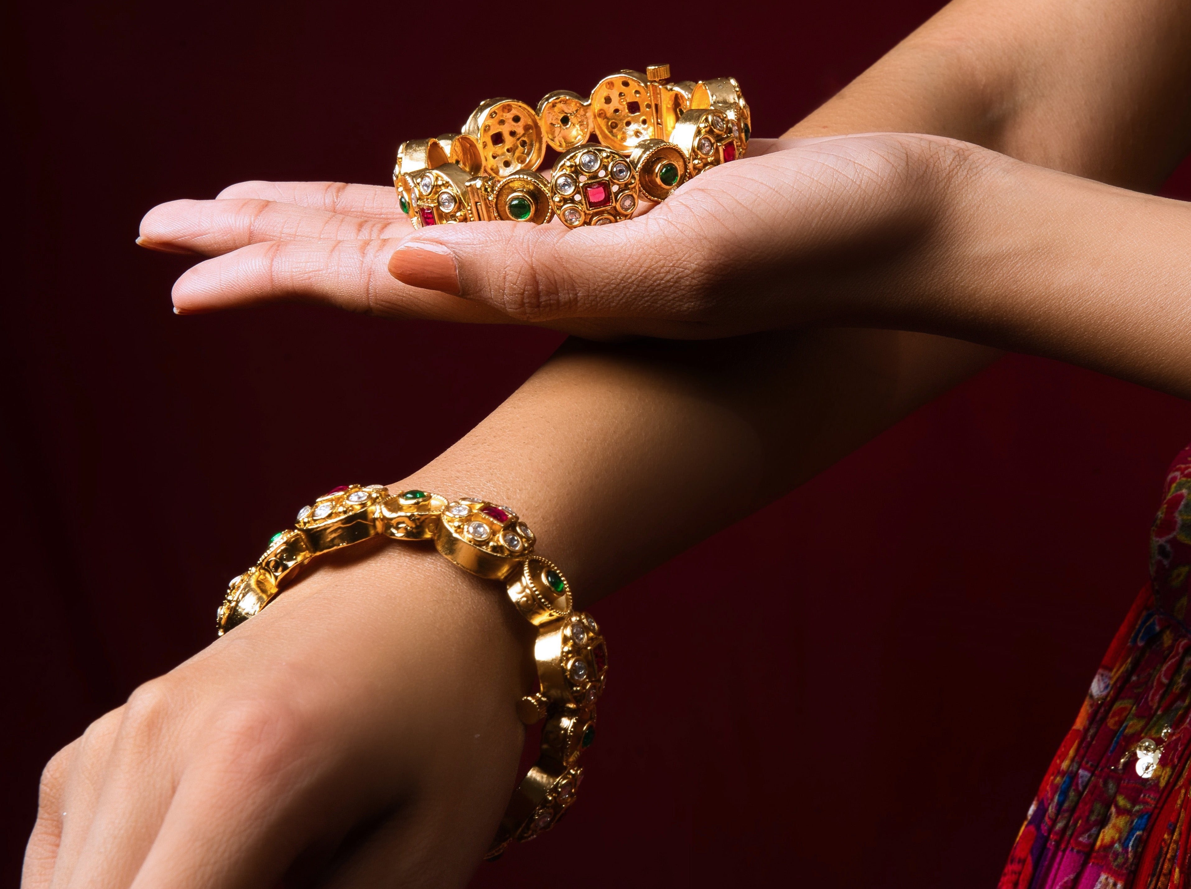 Gold-Plated Temple Bangles: Expertly crafted works of art adorned with custom-designed gems and semi-precious stones