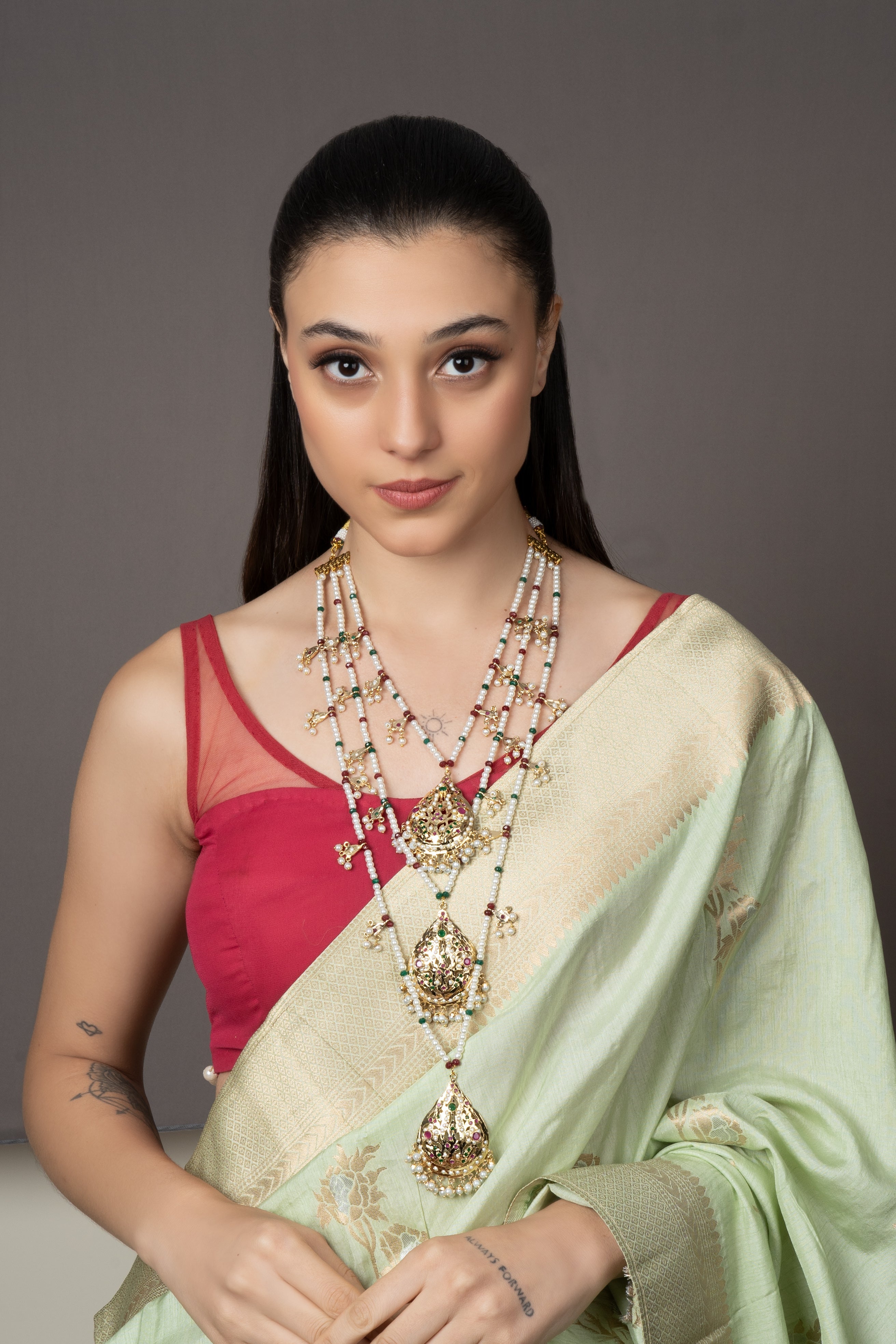 Exquisite Triple Layer Multicolour Jadau Mala: A sophisticated, handcrafted necklace with vibrant layers, perfect for adding elegance to any outfit.