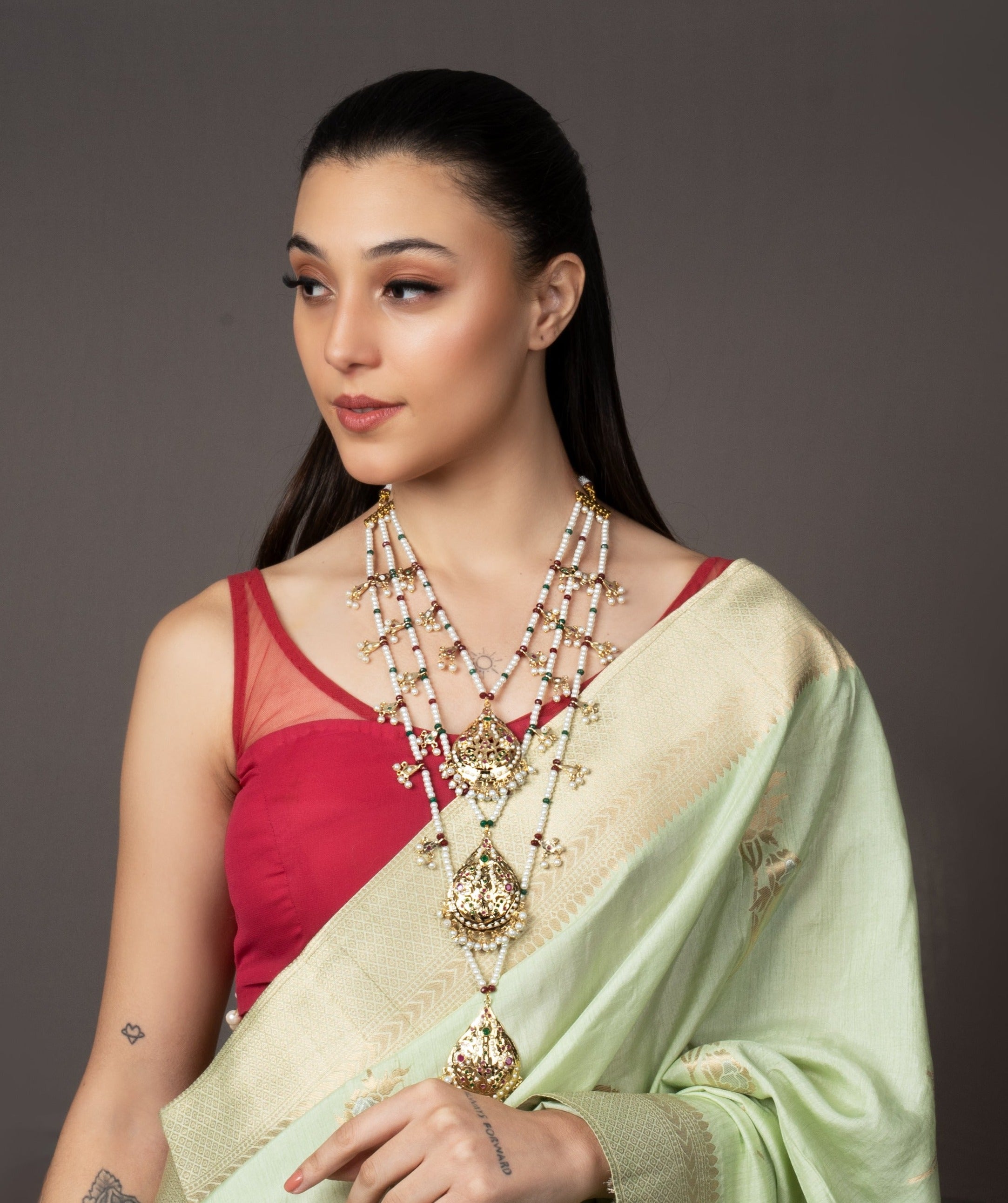 Exquisite Triple Layer Multicolour Jadau Mala: A sophisticated, handcrafted necklace with vibrant layers, perfect for adding elegance to any outfit.