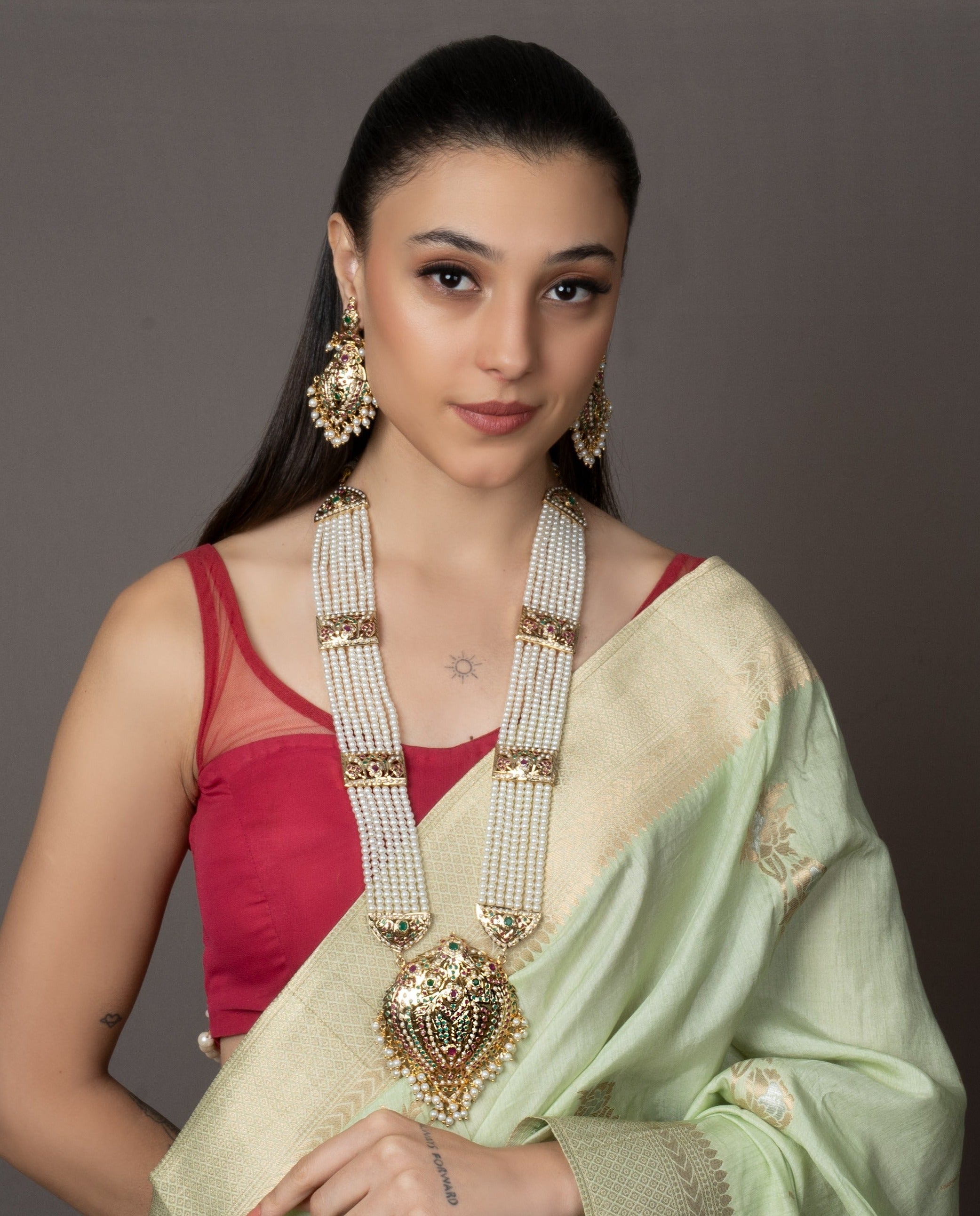 Handcrafted Royale Jadau Rani Haar Set, ideal for festive occasions, showcasing traditional design with a royal aura.