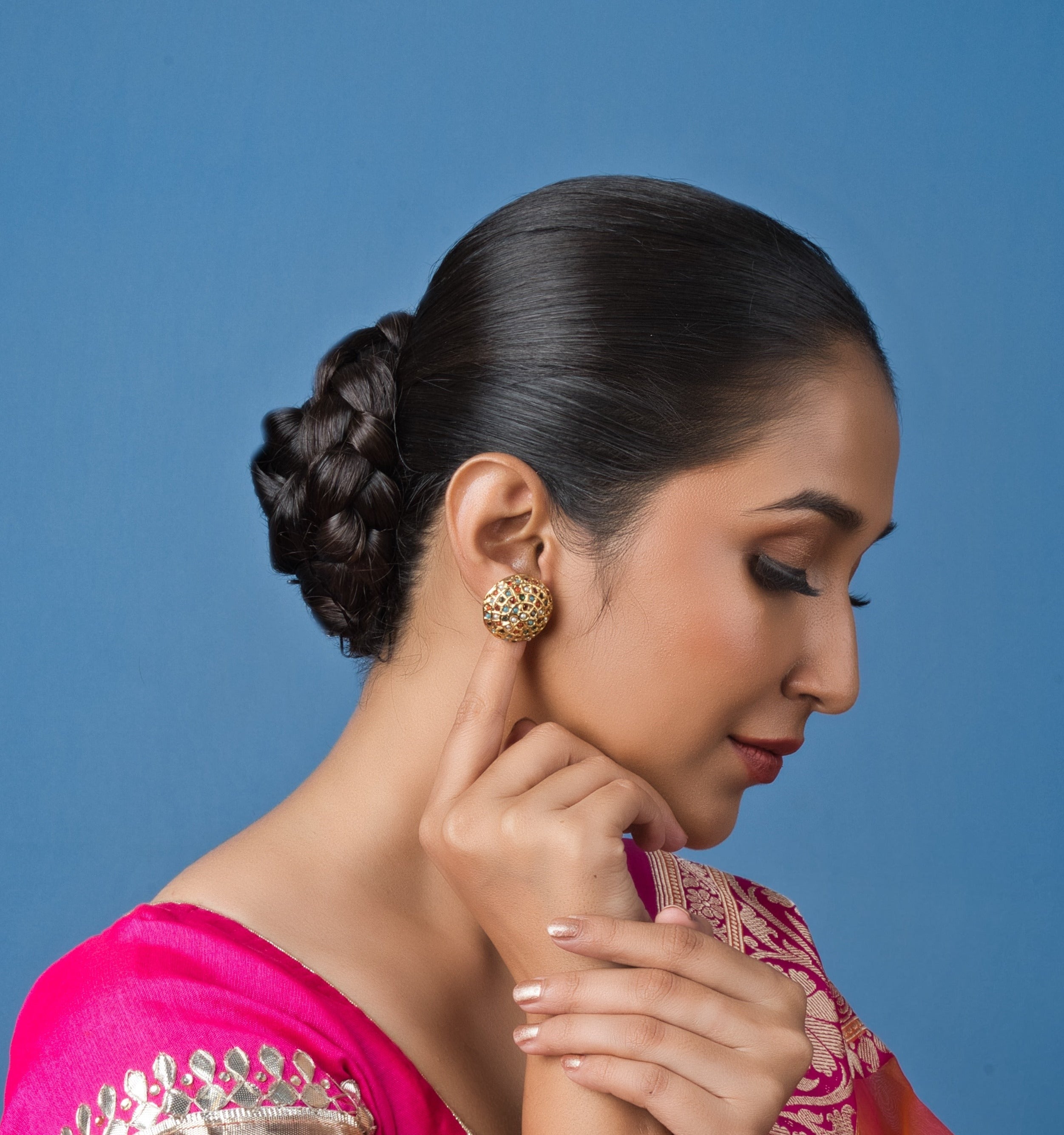 Gold Navratan Stud Earrings with stunning gemstones and push-back closures, perfect for everyday wear or special occasions.