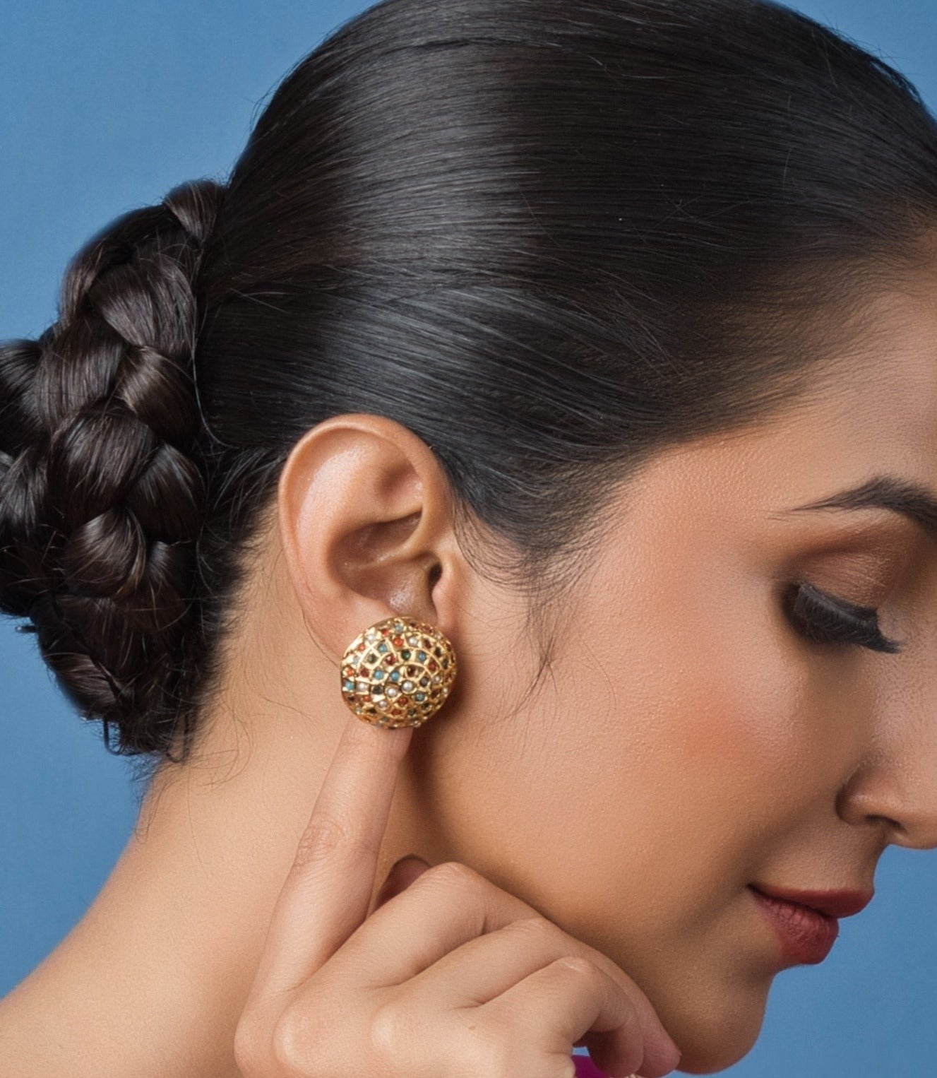 Gold Navratan Stud Earrings with stunning gemstones and push-back closures, perfect for everyday wear or special occasions.