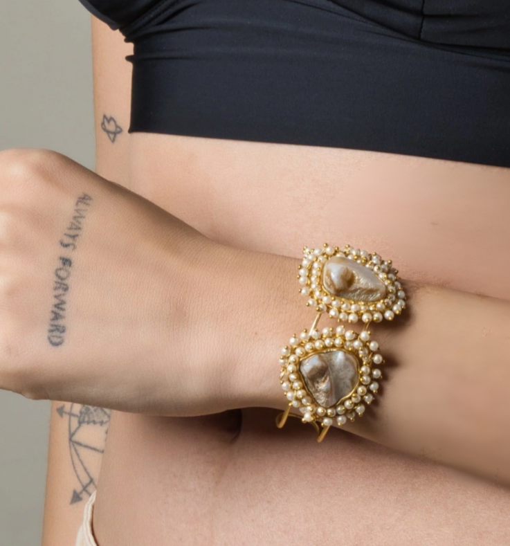 Elevate your style with our Handcrafted Baroque Triple Stone Cuff, a chic statement piece of modern handmade jewelry