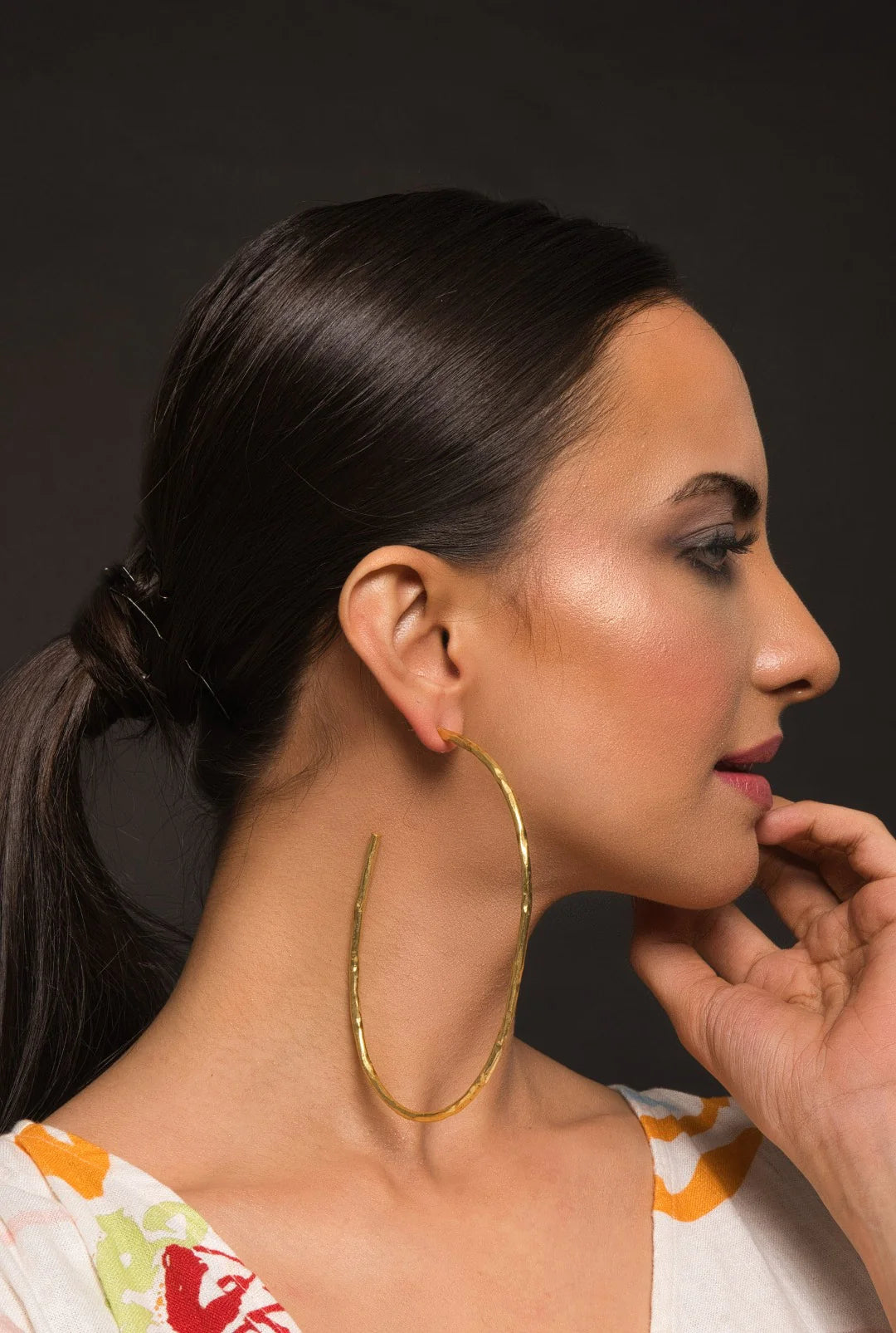 Golden Halo Hoops: Handcrafted artisanal earrings plated in 18k gold, perfect for making a luxurious fashion statement