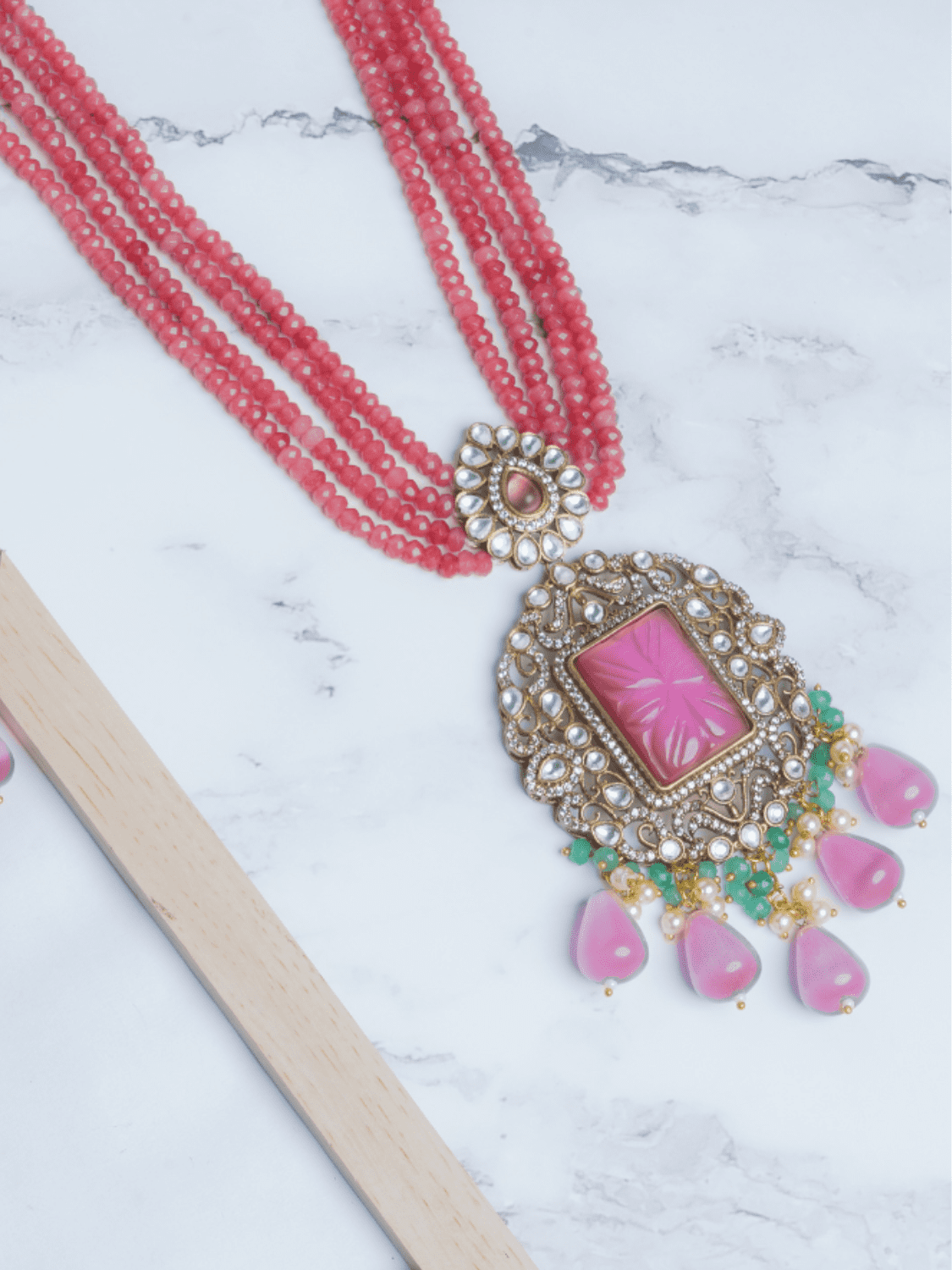 Multi string pink kundan drops long necklace