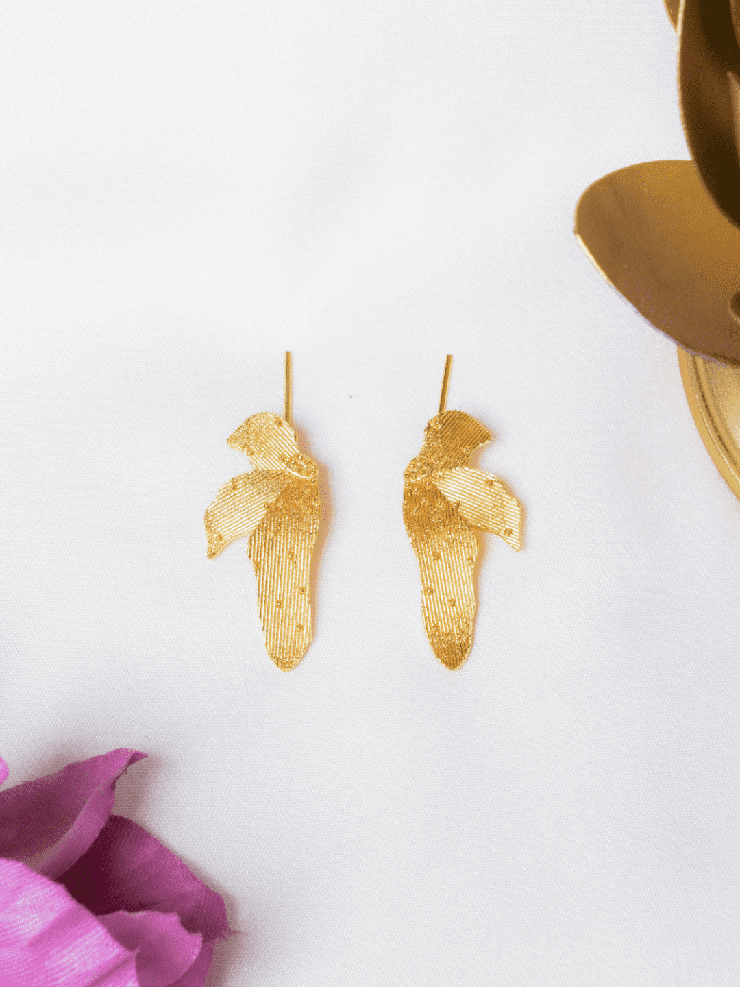 Gold plated leaf shaped dangler earrings