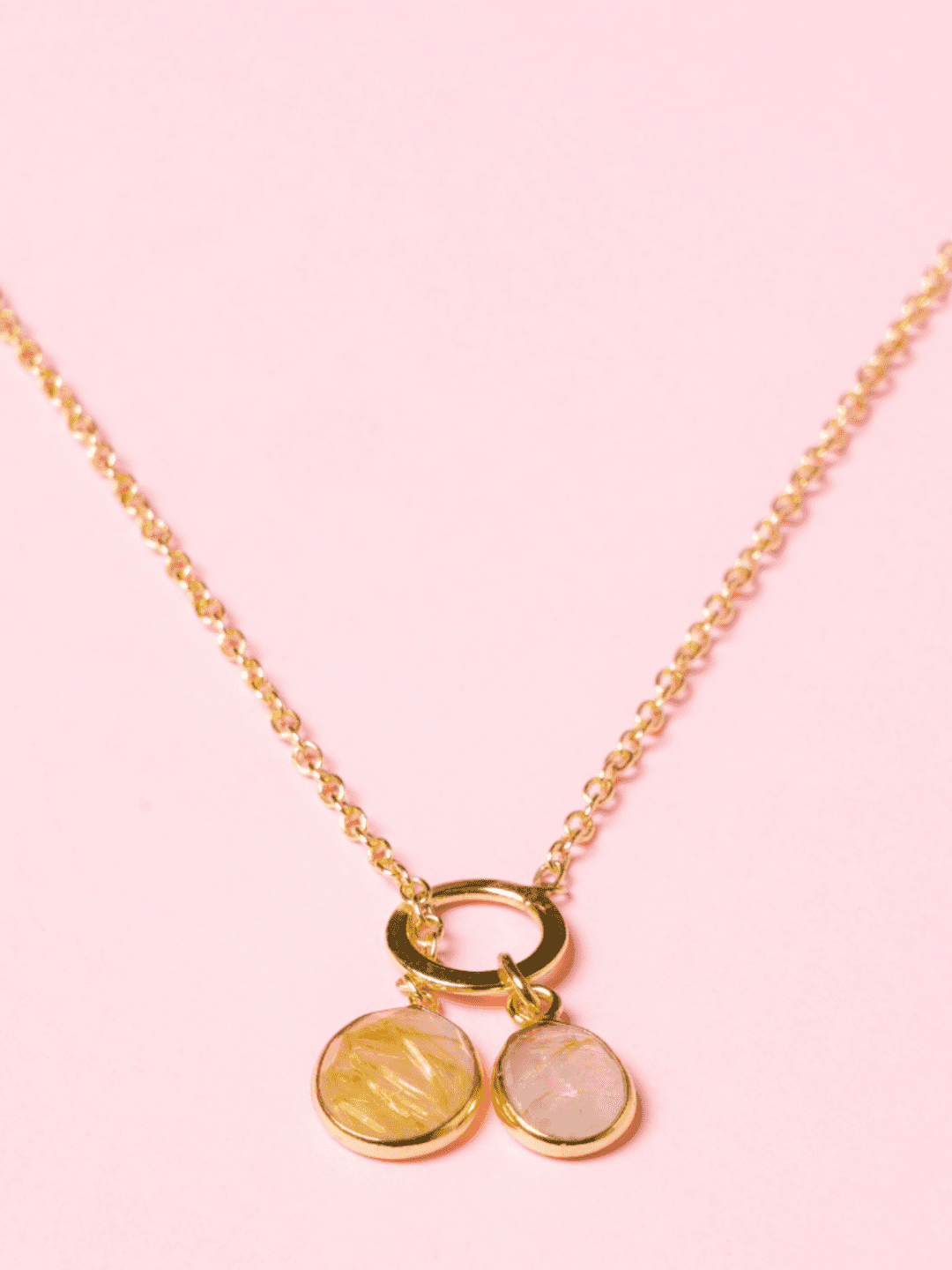 Dual rutile pendant necklace with a gold plated chain