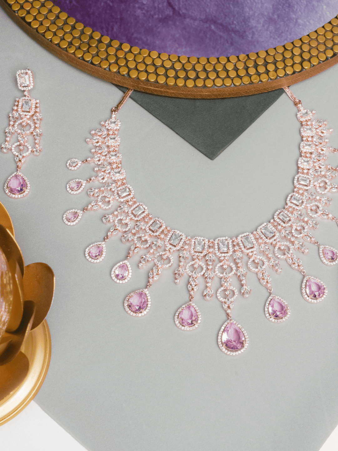 Sold at Auction: Unsigned pink aurora borealis and purple rhinestone Peter  Pan collar diamante necklace and drop earring set